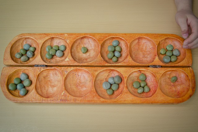 Traditional congklak game: fun activity for Mom and kids